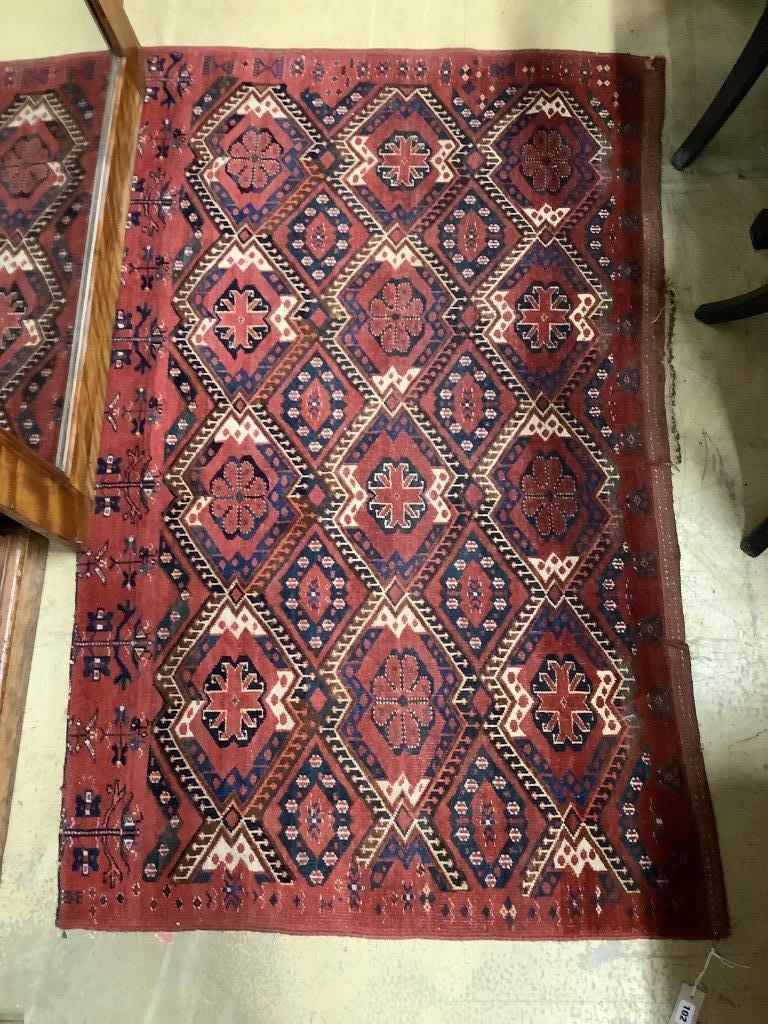 A pair of Caucasian red ground rugs, 154 x 97cm